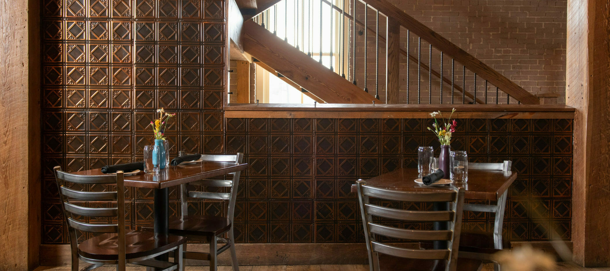 Cozy Corner Dining Tables near the stairs at The Mill in Hershey